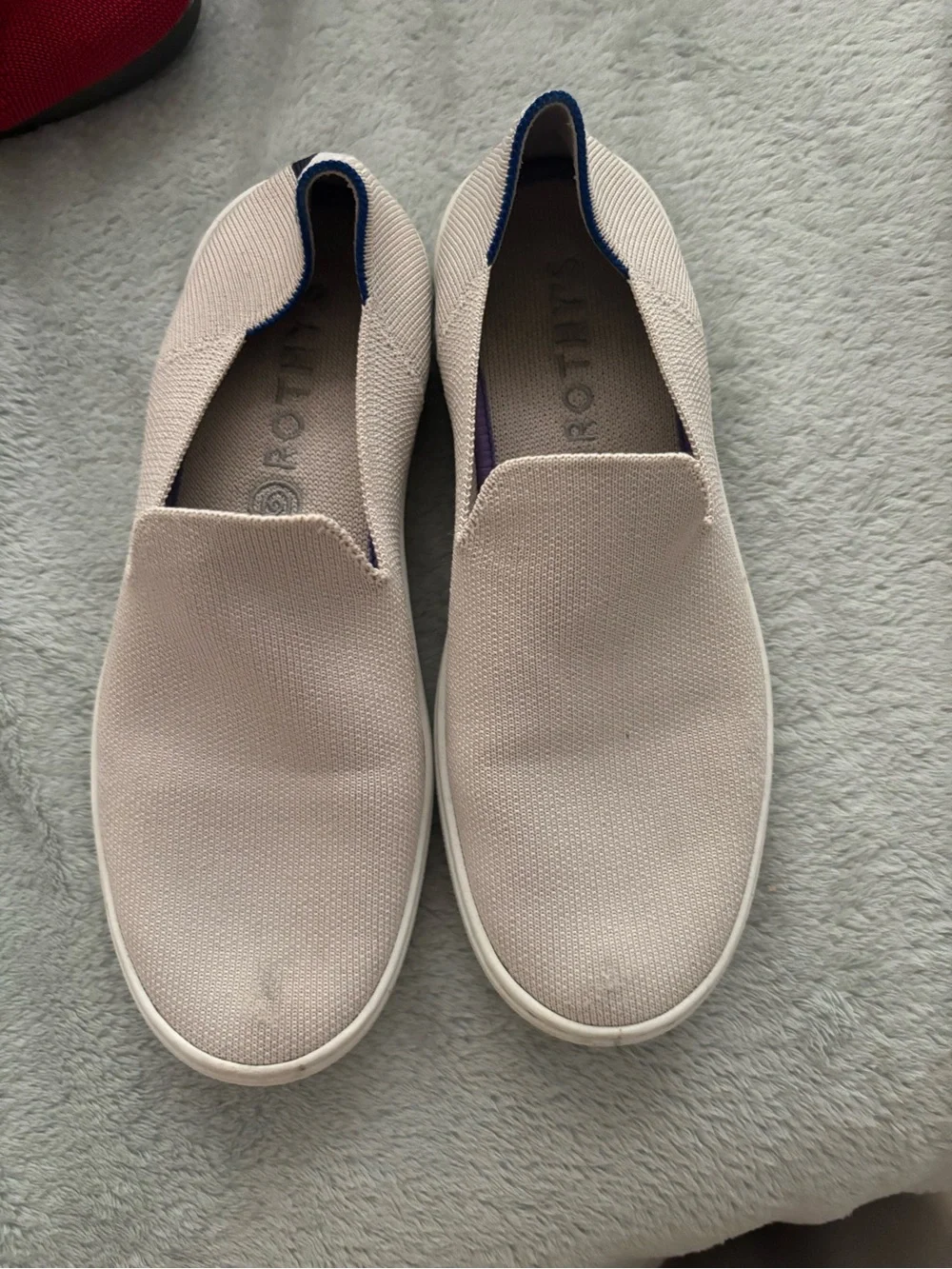 Rothy's Slip-On Athletic Sneakers in Light Beige with Blue Trim